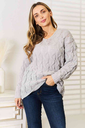 Cozy Up in Cable-Knit Hooded Sweater