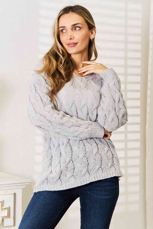 Cozy Up in Cable-Knit Hooded Sweater